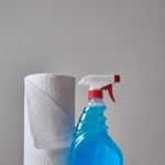 windex bottle and paper towels
