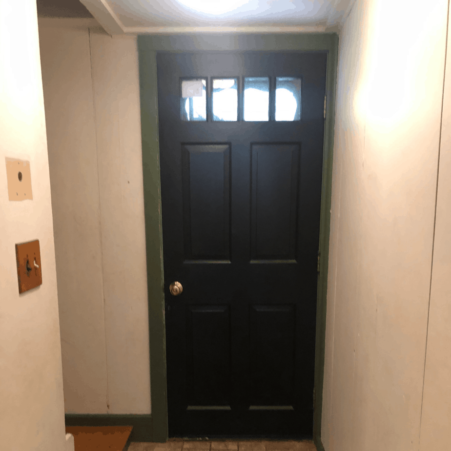 black door why green trim in an entryway 