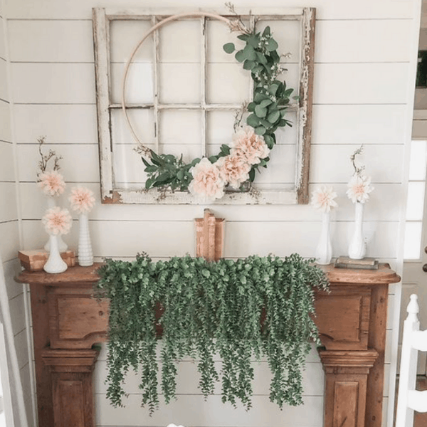 mantel decor with greenery singing down