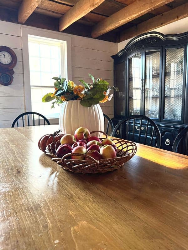 Basket of apples as centerpiece.